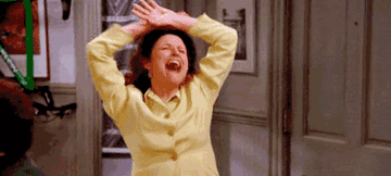 A gif of Elaine from Seinfeld being excited