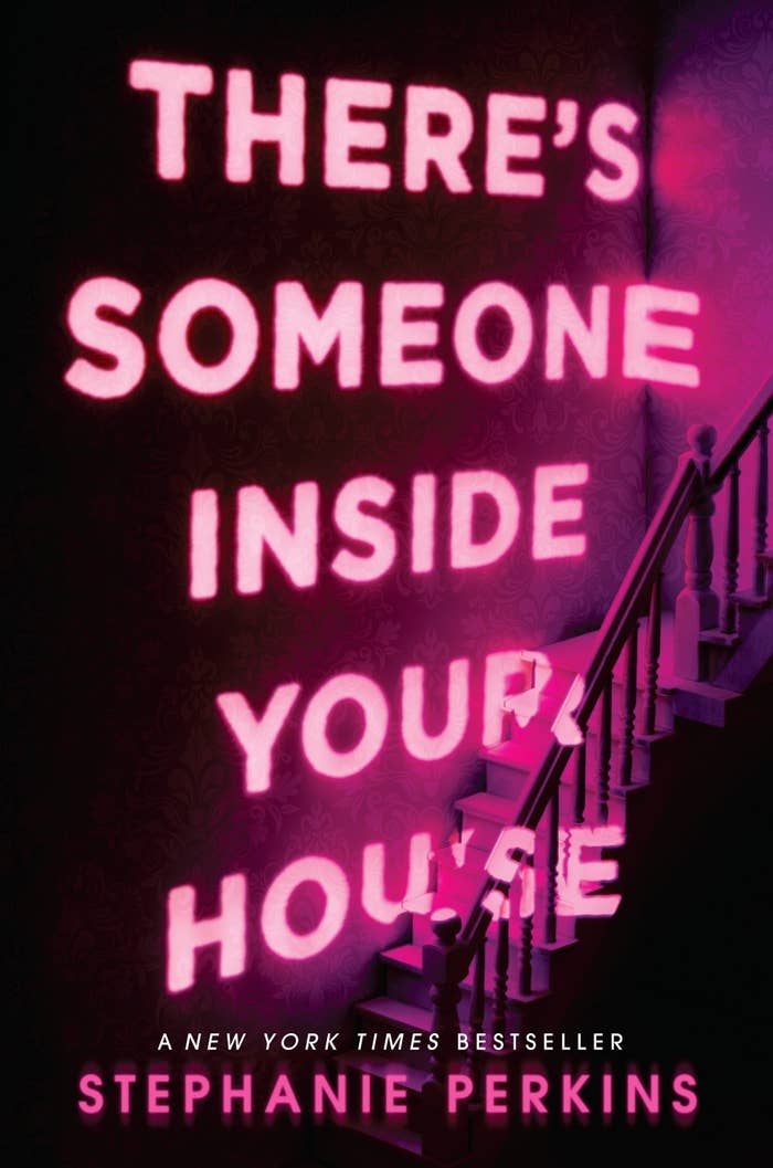 The cover art for There's Someone Inside Your House which has the title hovering over a stairwell