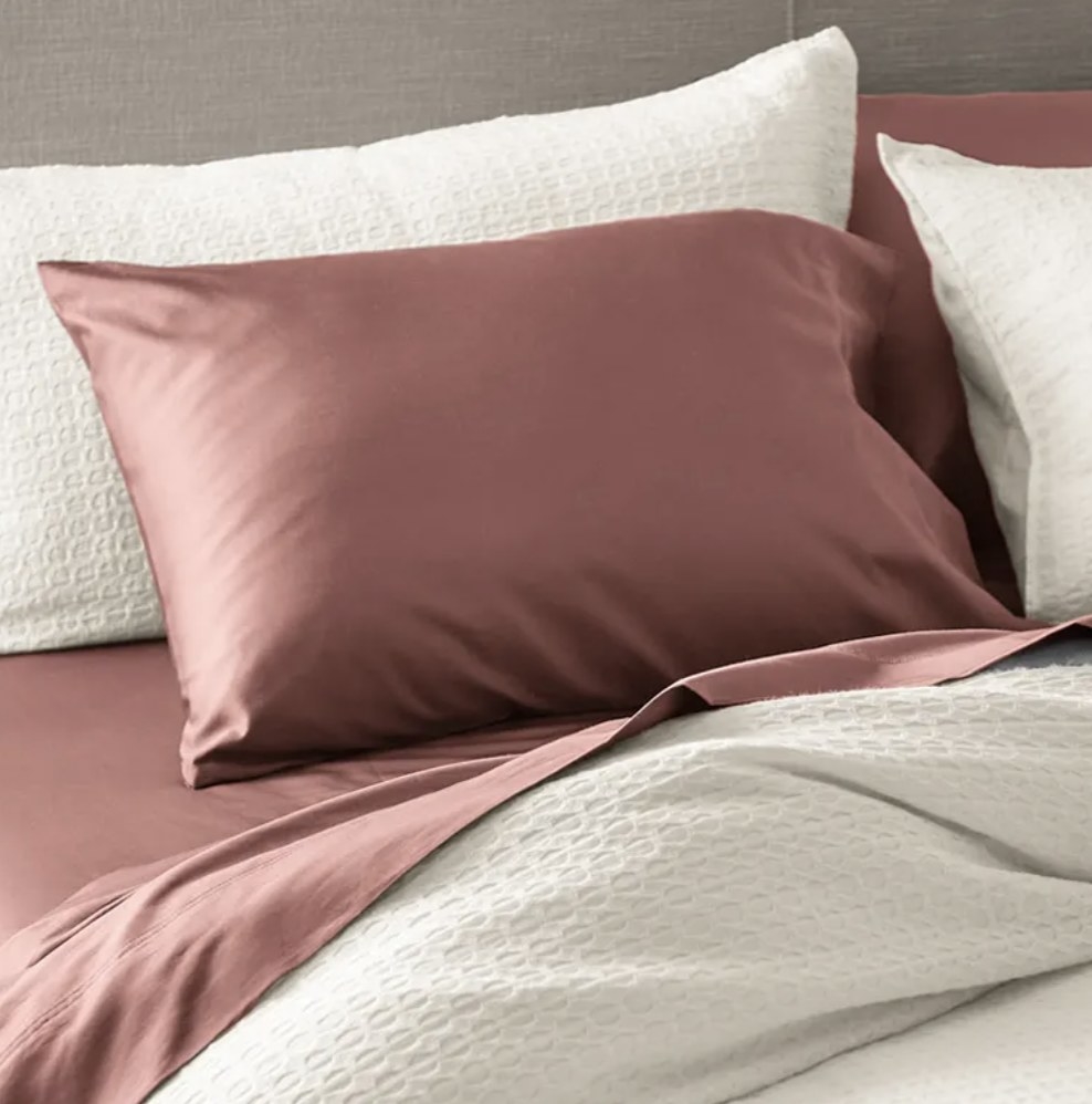 the pillowcases on a pillow in rose
