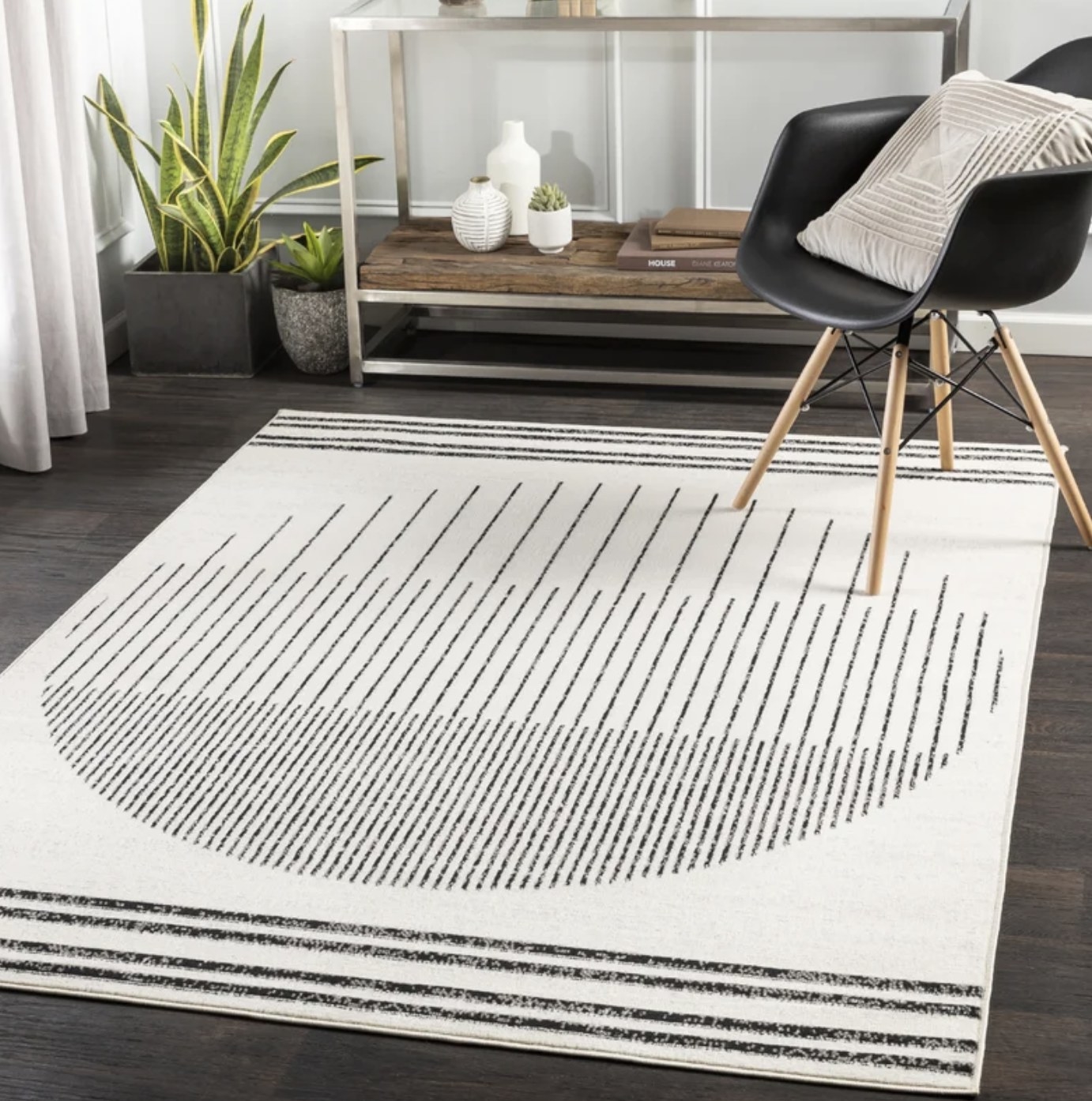 An abstract black and ivory area rug