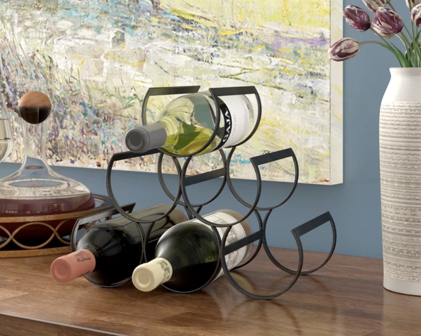 A wine bottle rack with bottles in it