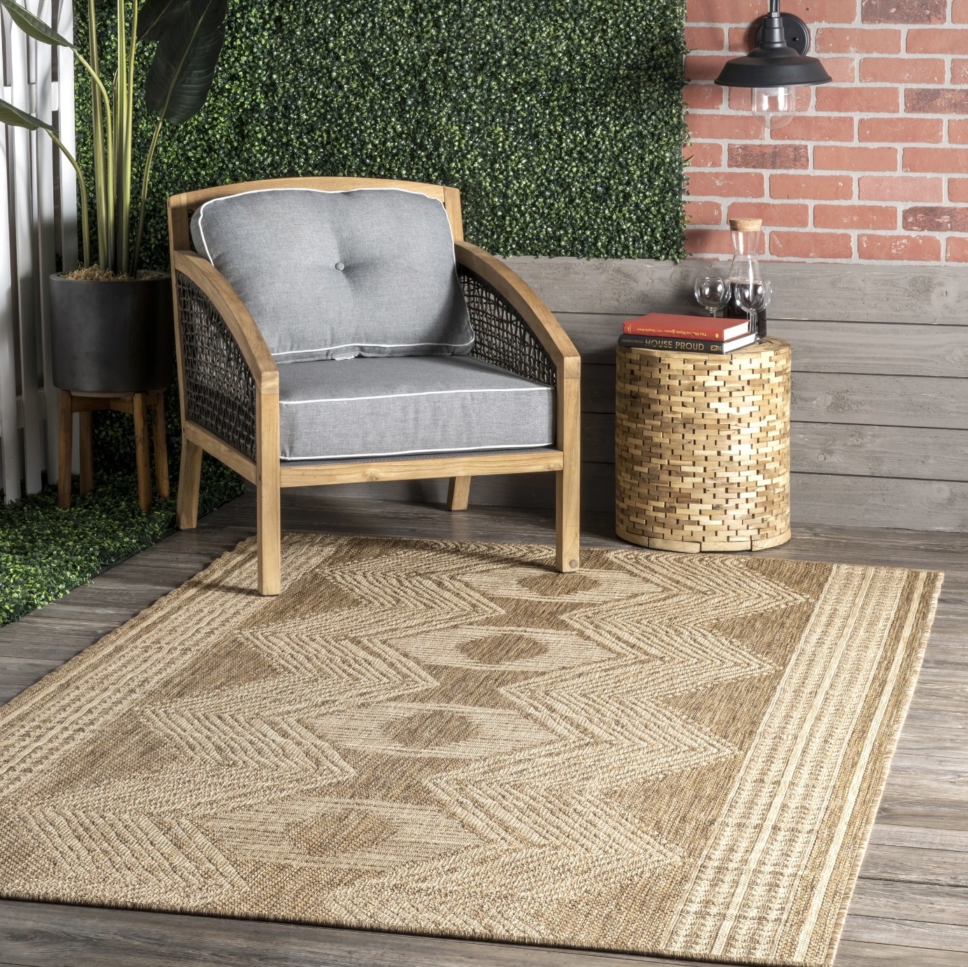 A tan geometric indoor outdoor area rug