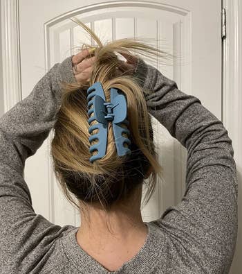 blue claw clip in reviewer's hair