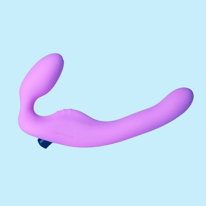 Purple double-ended dildo with bullet vibrator