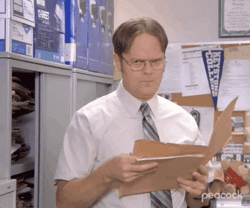 a gif of Dwight in &quot;The Office&quot; saying &quot;The holy grail&quot; into the camera