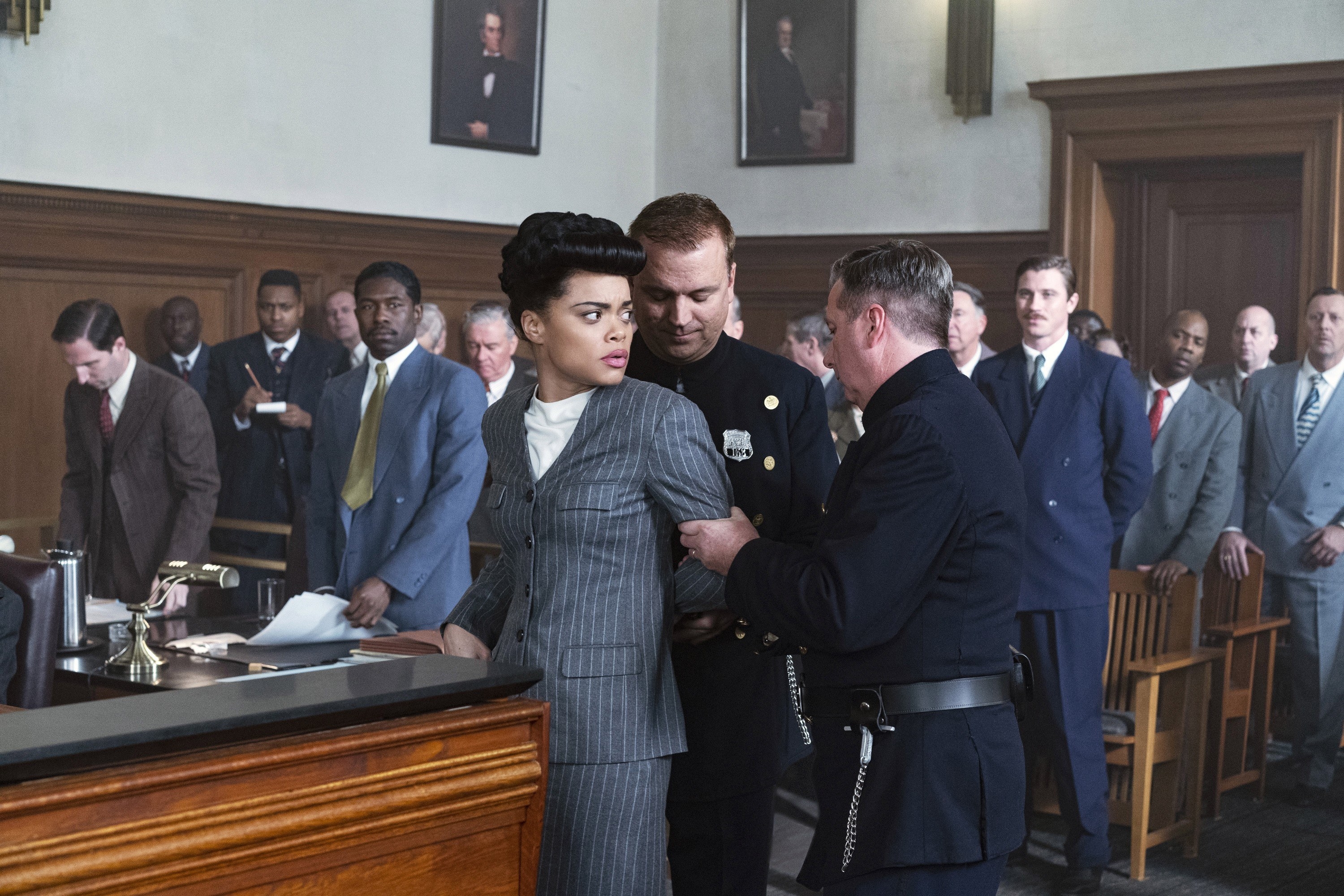 Billie Holiday wearing a skirt suit during trial