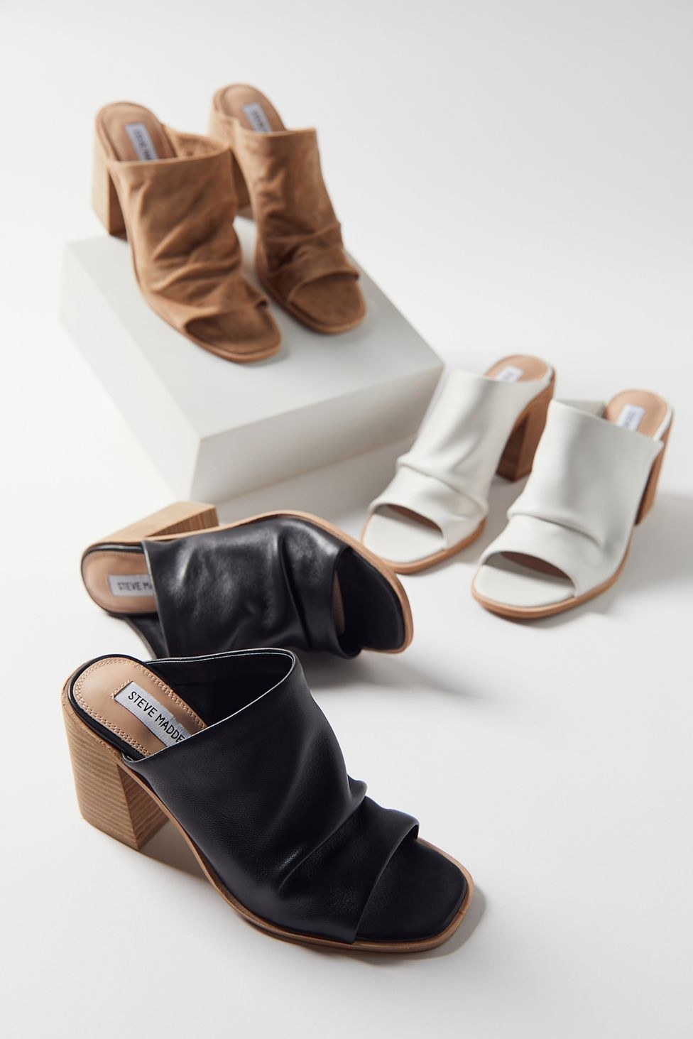 the heels in black, brown and white