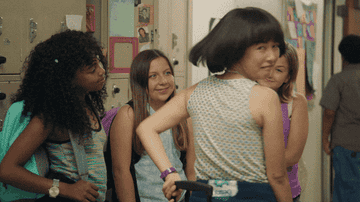 Gif of Anna giving Maya a thumbs up in Pen15