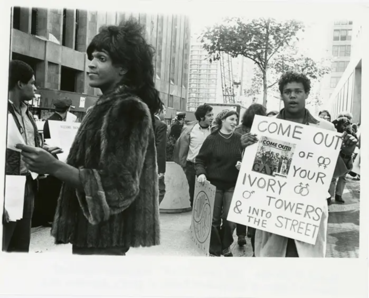 A 1970 photo of Marsha P. Johnson handing out flyers in support of Gay Students at NYU is seen here courtesy of the New York Public Library&#x27;s &quot;1969: The Year of Gay Liberation&quot; exhibit