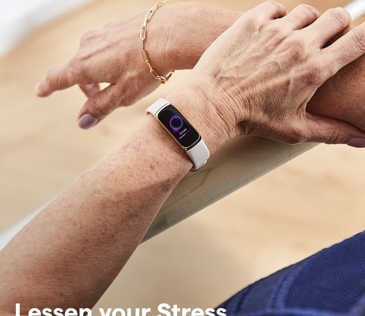 A person wearing the fitness tracker on their left arm
