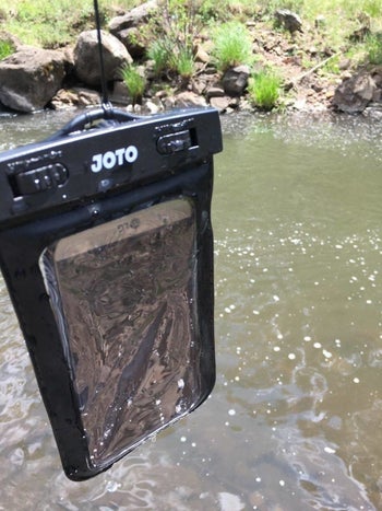 Reviewer image of phone safe in the case after being in river 