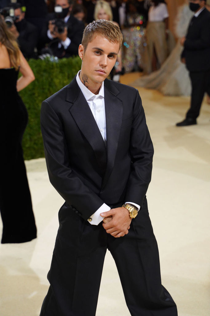Justin wore a simple dark suit
