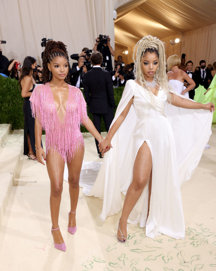 Chloe x Halle pose together on the Met steps holding hands