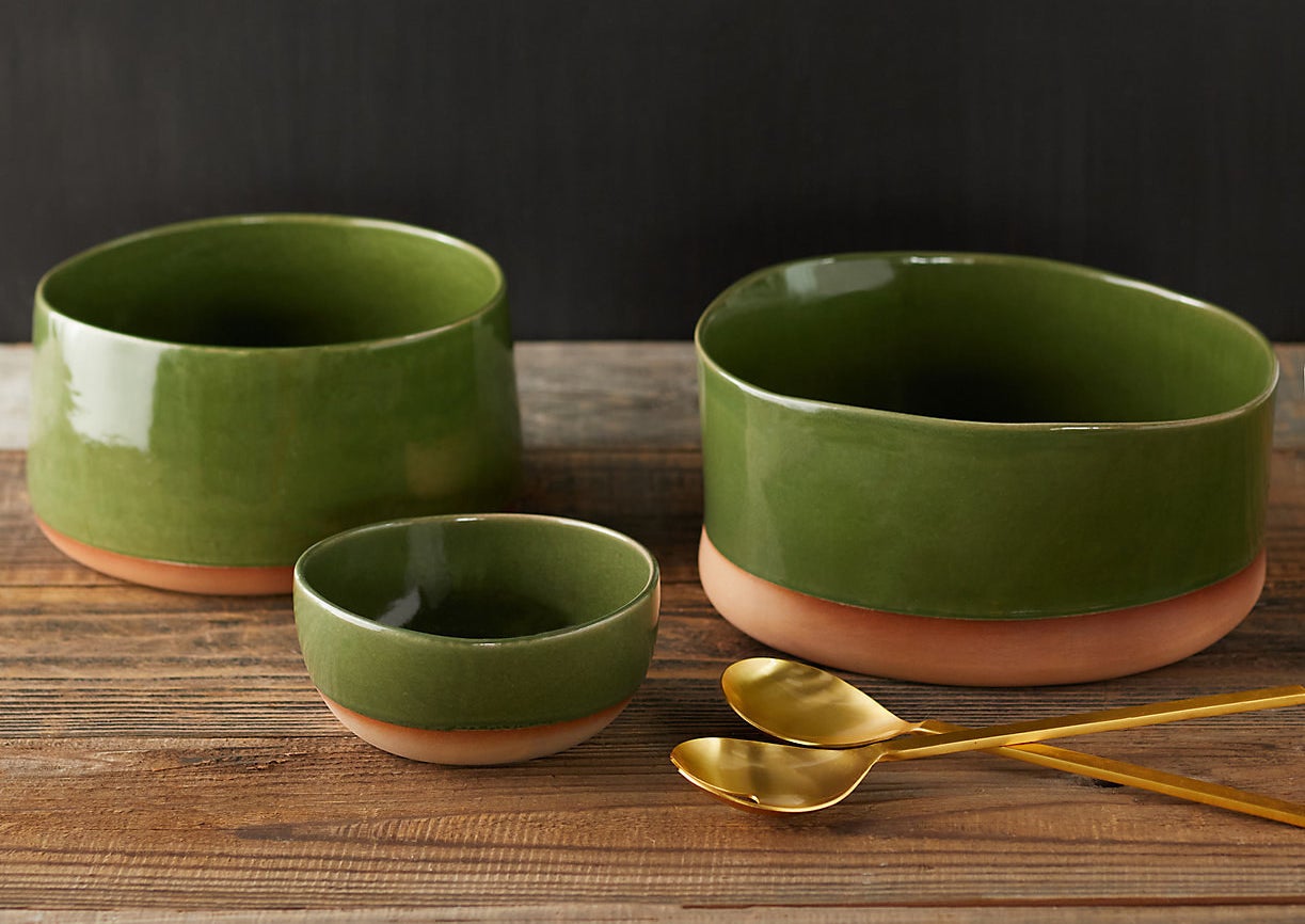 three green ceramic bowls
