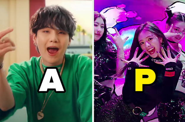 K-Pop stars are dancing in front of the camera labeled, "A" and "P"