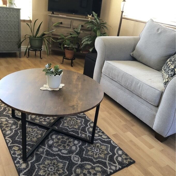 Review. photo of the round cross-legged coffee table