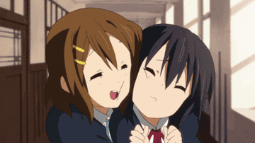 Two female anime characters hugging