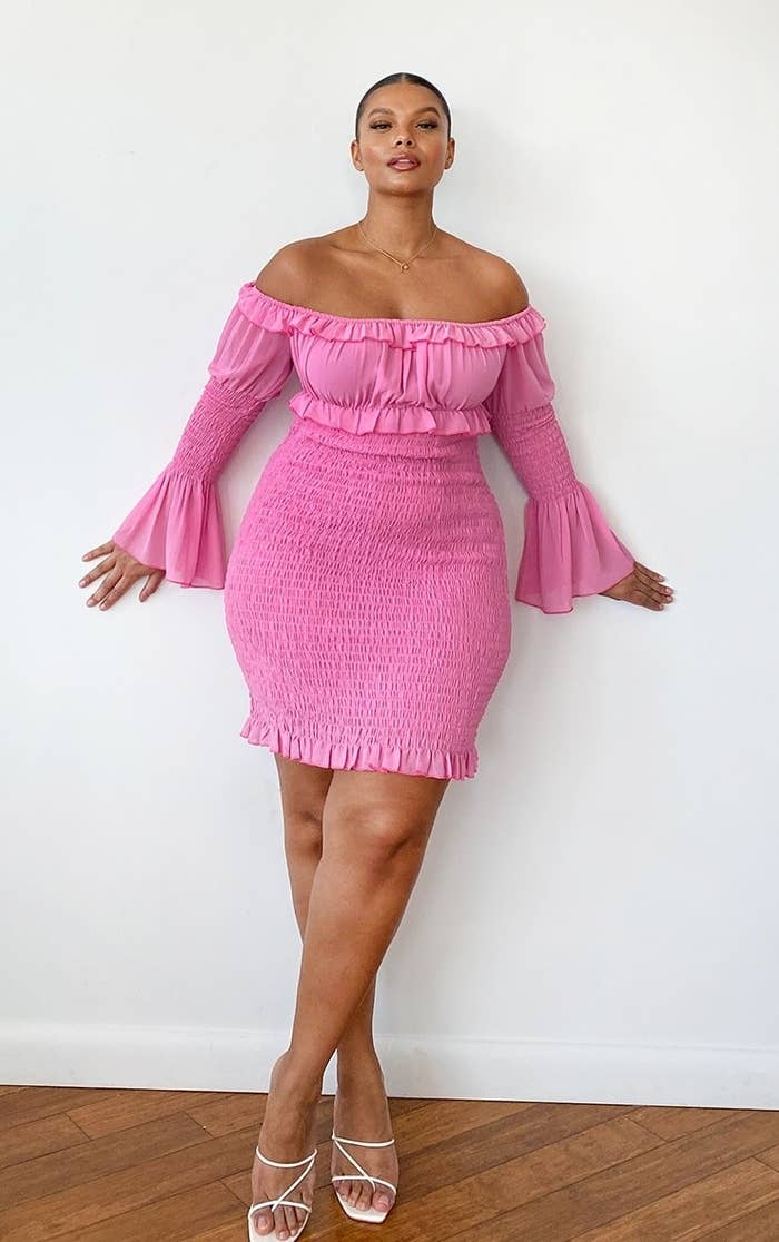 model wearing pastel pink dress