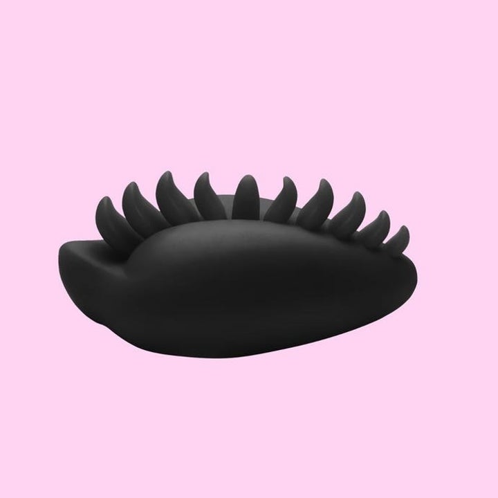 Black stimulating cushion with ridges