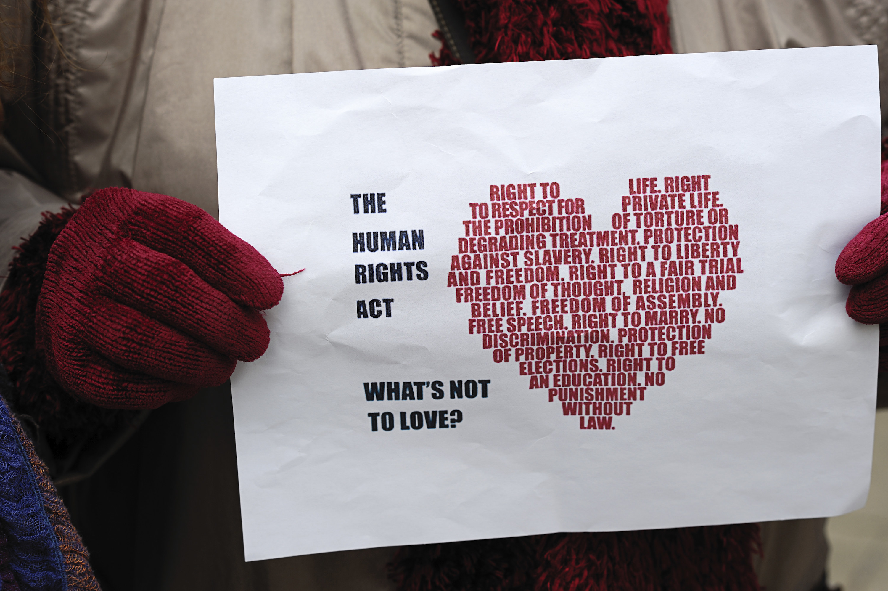 Sign shows a heart with text referencing the Human Rights Act