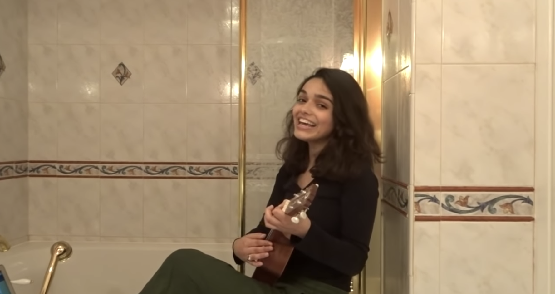 Rachel Zegler singing in her bathroom