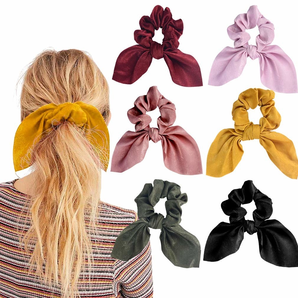 a model wearing a mustard hair scrunchie