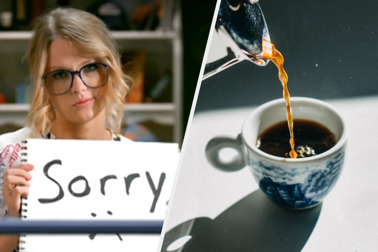 Taylor Swift holds up a hand made sign that says, 