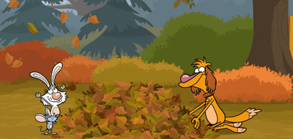 a cartoon bunny and dog playing with a leaf pile