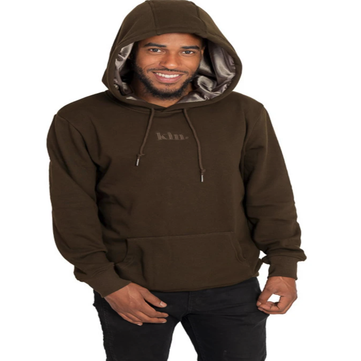 model wearing the hoodie in dark green