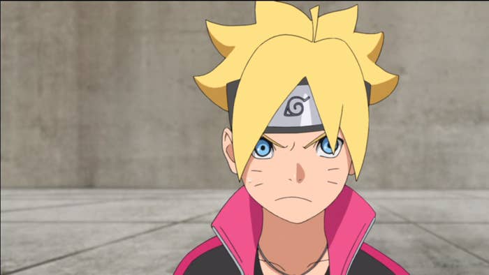 boruto has a scrunched up face as if mad