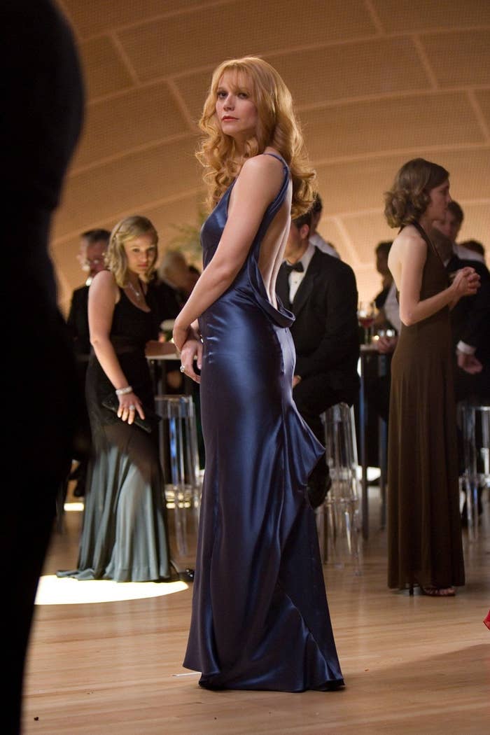 Pepper Pot's in a silk, floor-length dress