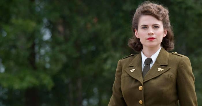 Peggy Carter wearing a blazer jacket, tie, and shirt. 