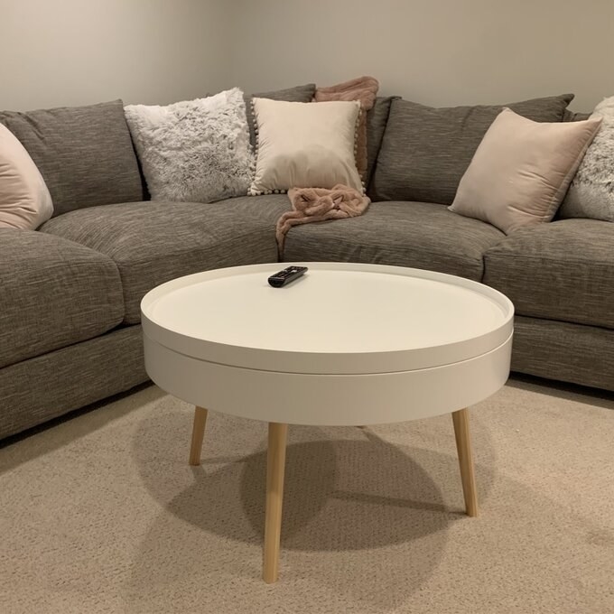 Review photo of the rounded wood coffee table