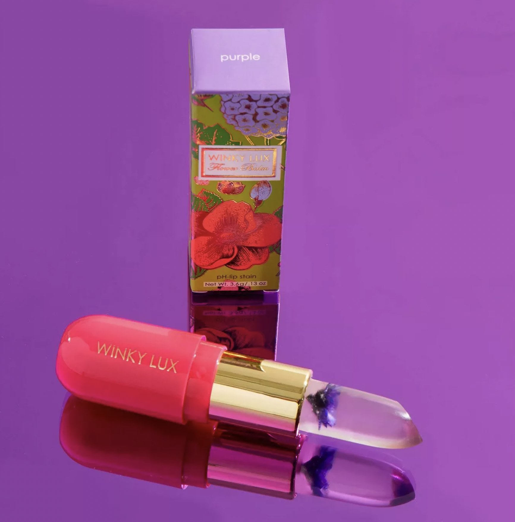 Winky Lux Flower Balm Lip against purple background