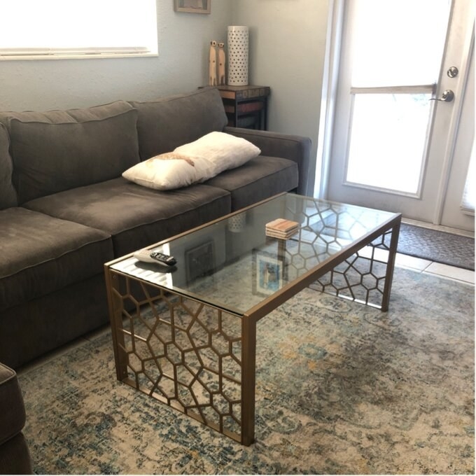Review photo of the brass-finished sled coffee table
