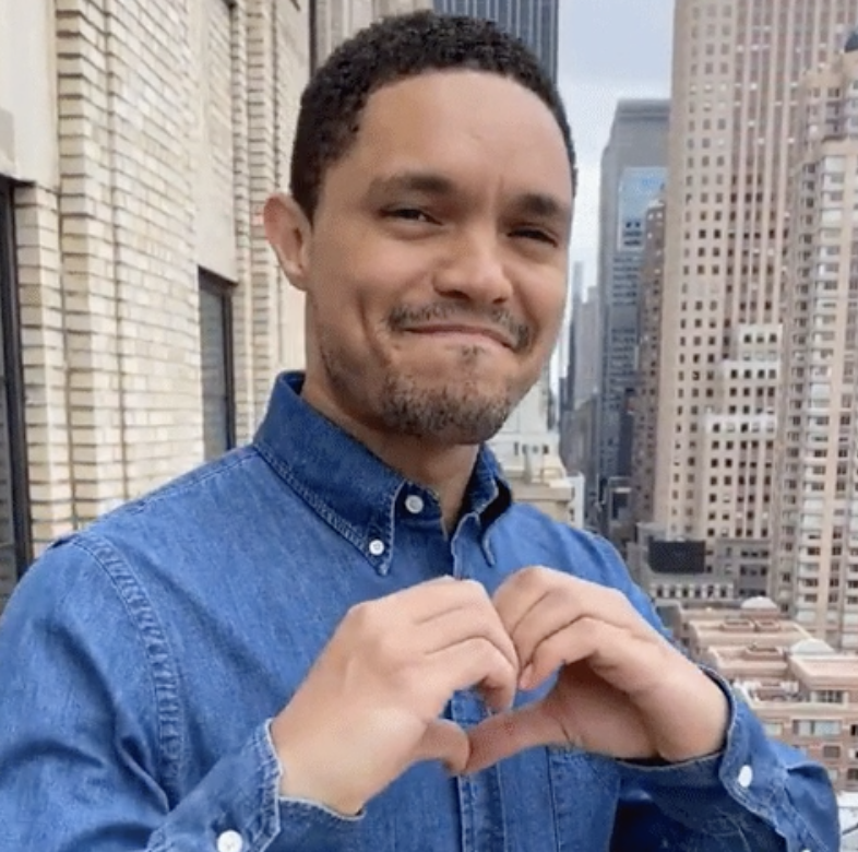 Trevor Noah from &quot;The Daily Show&quot; making a heart sign with his hands