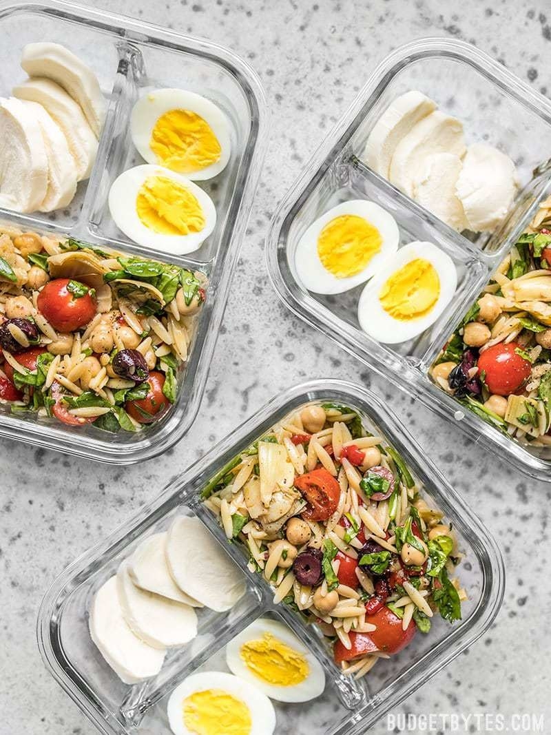 Orzo bowls with mozzarella and hard boiled eggs.