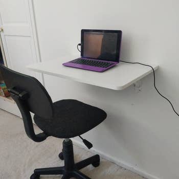 Reviewer image of white desk with laptop