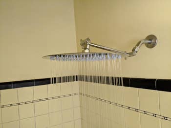 Reviewer photo of the shower head turned on
