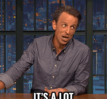 a gif of Seth Meyers sitting at a desk and saying &quot;It&#x27;s a lot&quot;