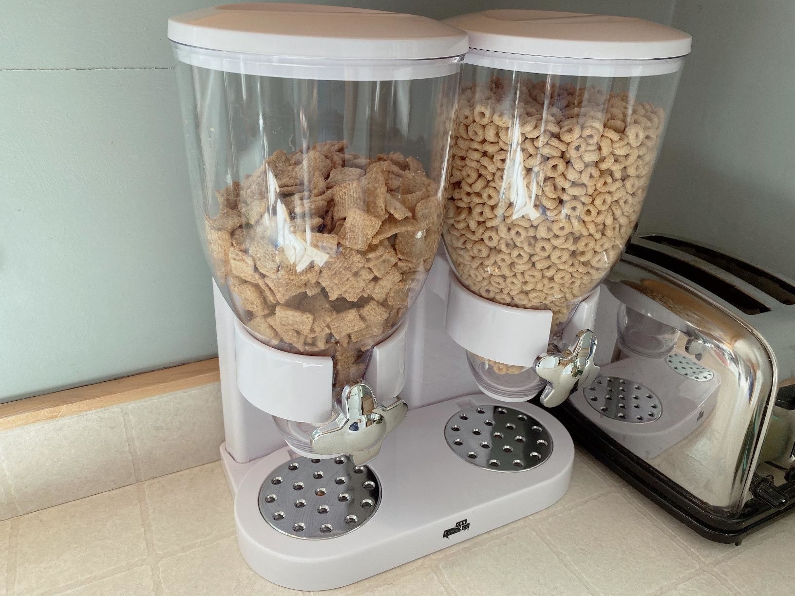 Reviewer photo of the dual cereal dispenser in white on a kitchen counter