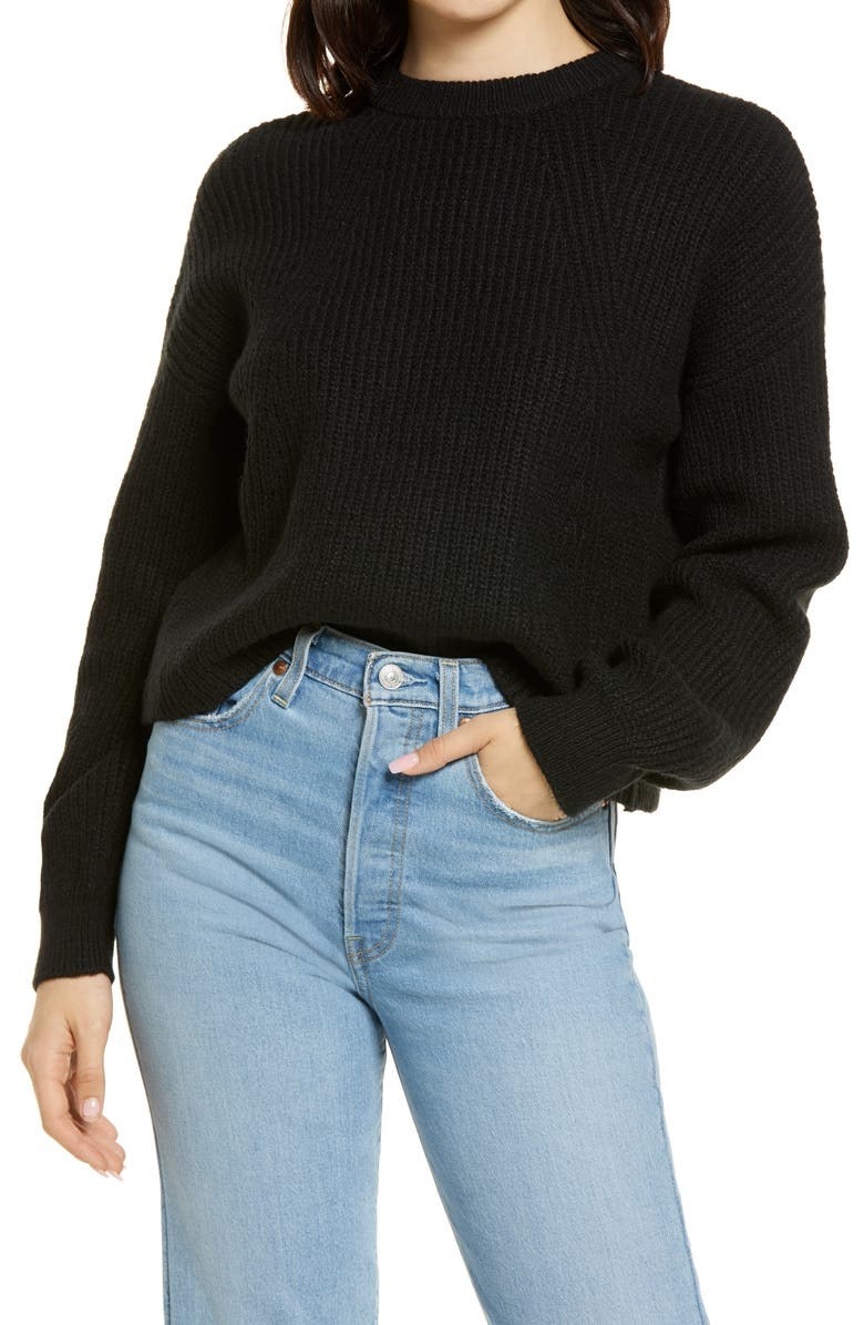 a black crewneck sweater