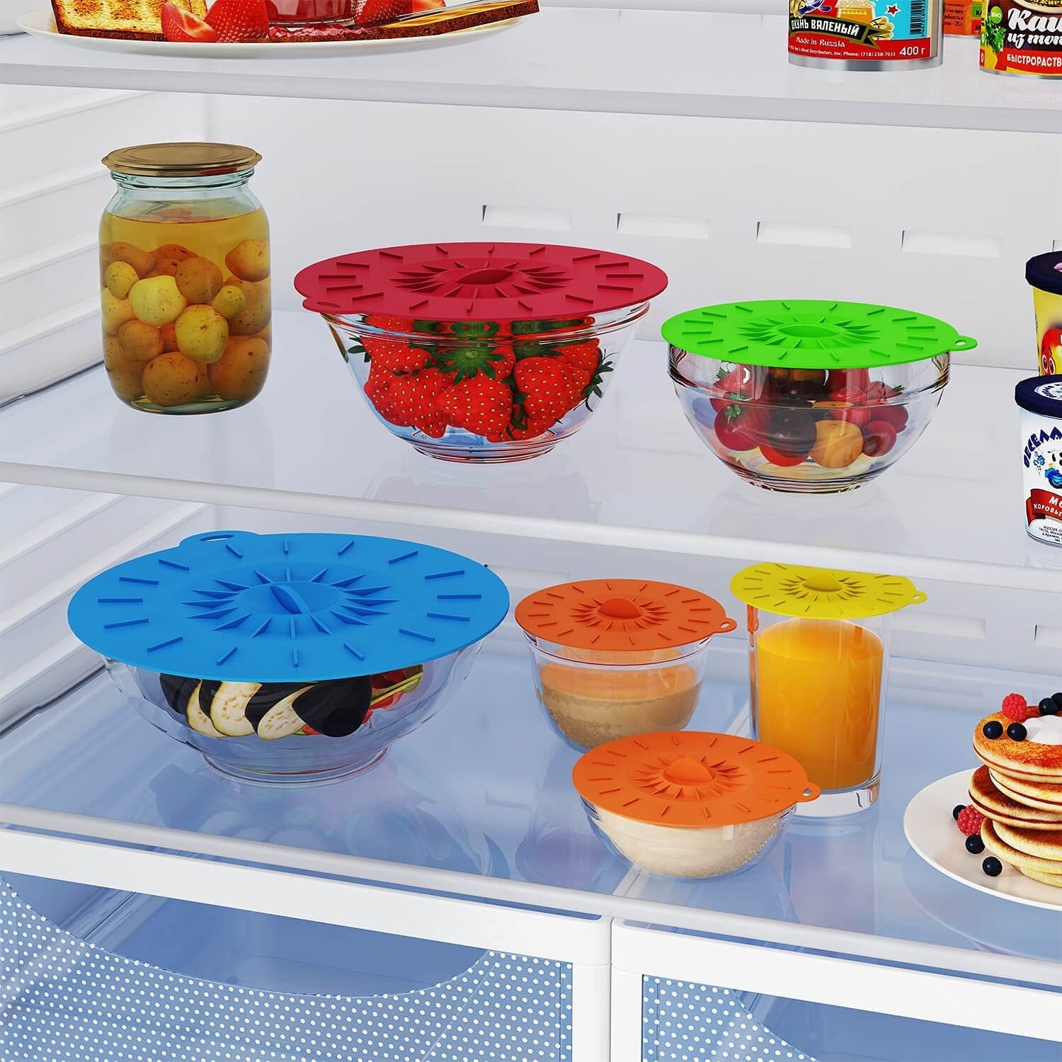 The silicone lids on top of containers in a fridge