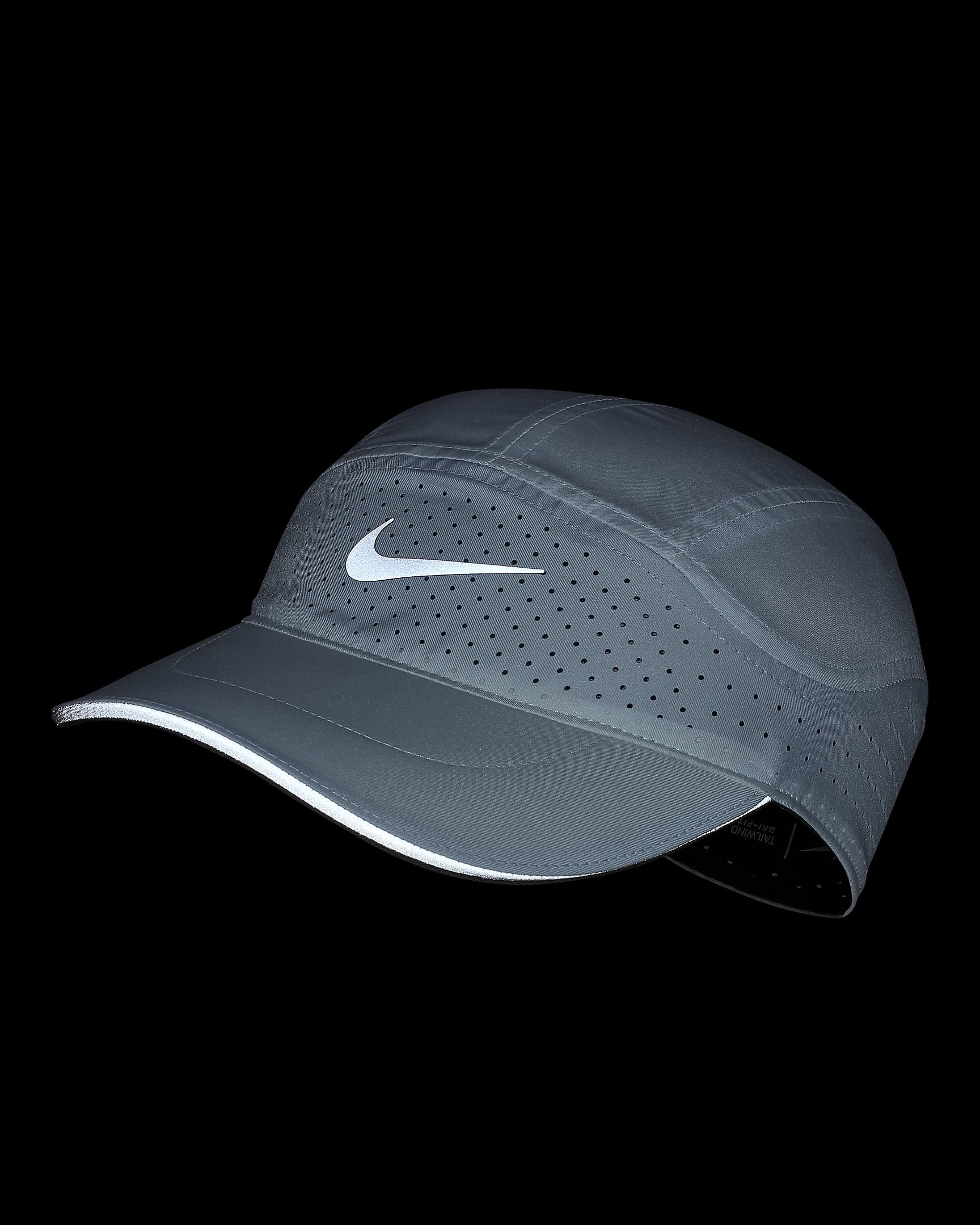 White Nike cap in dark to show reflective detailing