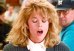 A gif of meg ryan faking an orgasm in when harry met sally