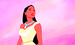 a gif of pocahontas with colorful leaves flowing around her