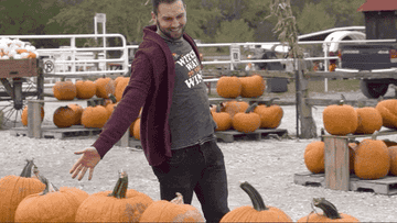 A man running through pumpkins.
