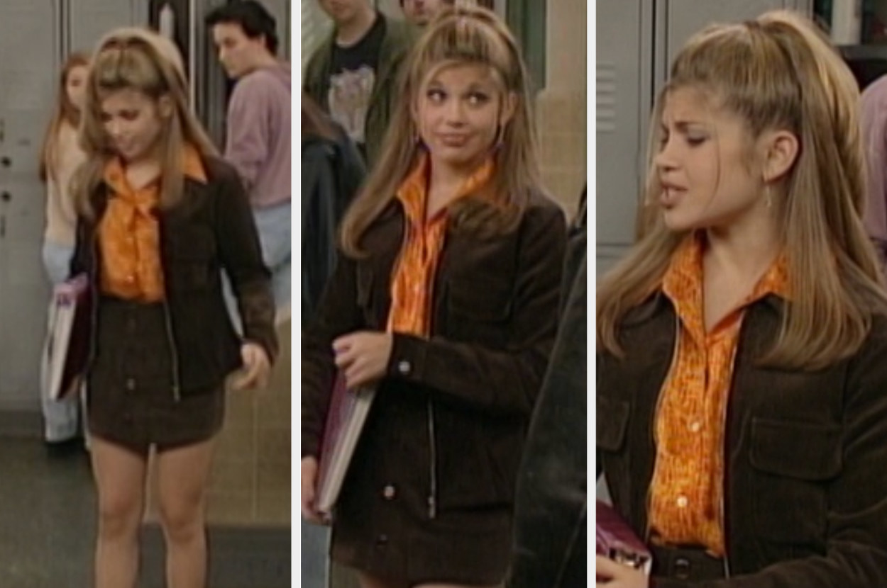 Topanga wearing a matching corduroy jacket and mini skirt with an orange collared blouse