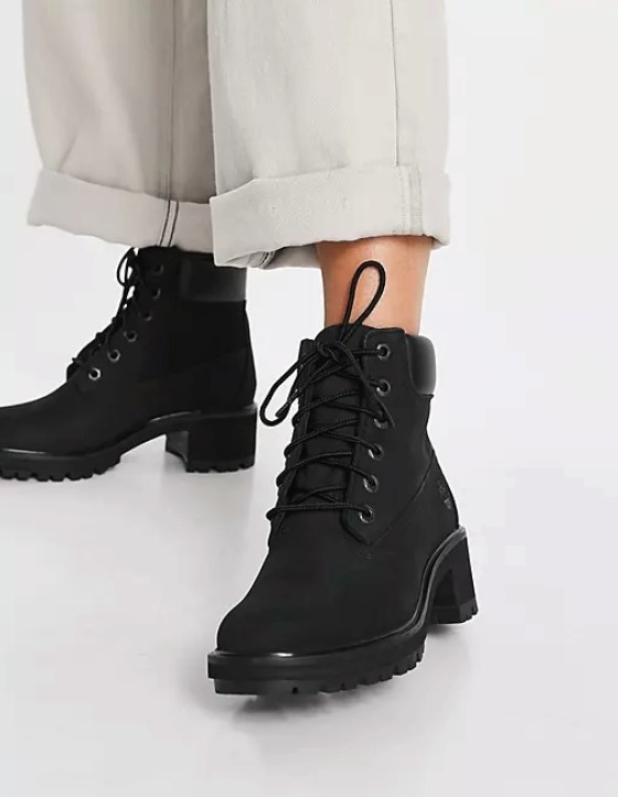 Close up of model wearing the lace up boots