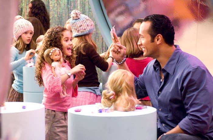 the rock and young madison in an American Girl store